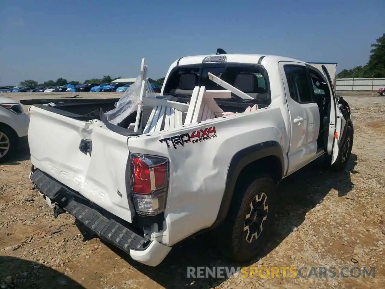 4 Photograph of a damaged car 5TFCZ5AN5MX272938 TOYOTA TACOMA 2021