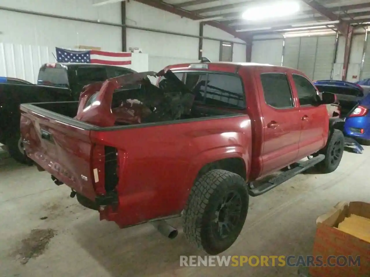 4 Photograph of a damaged car 5TFCZ5AN5MX282479 TOYOTA TACOMA 2021