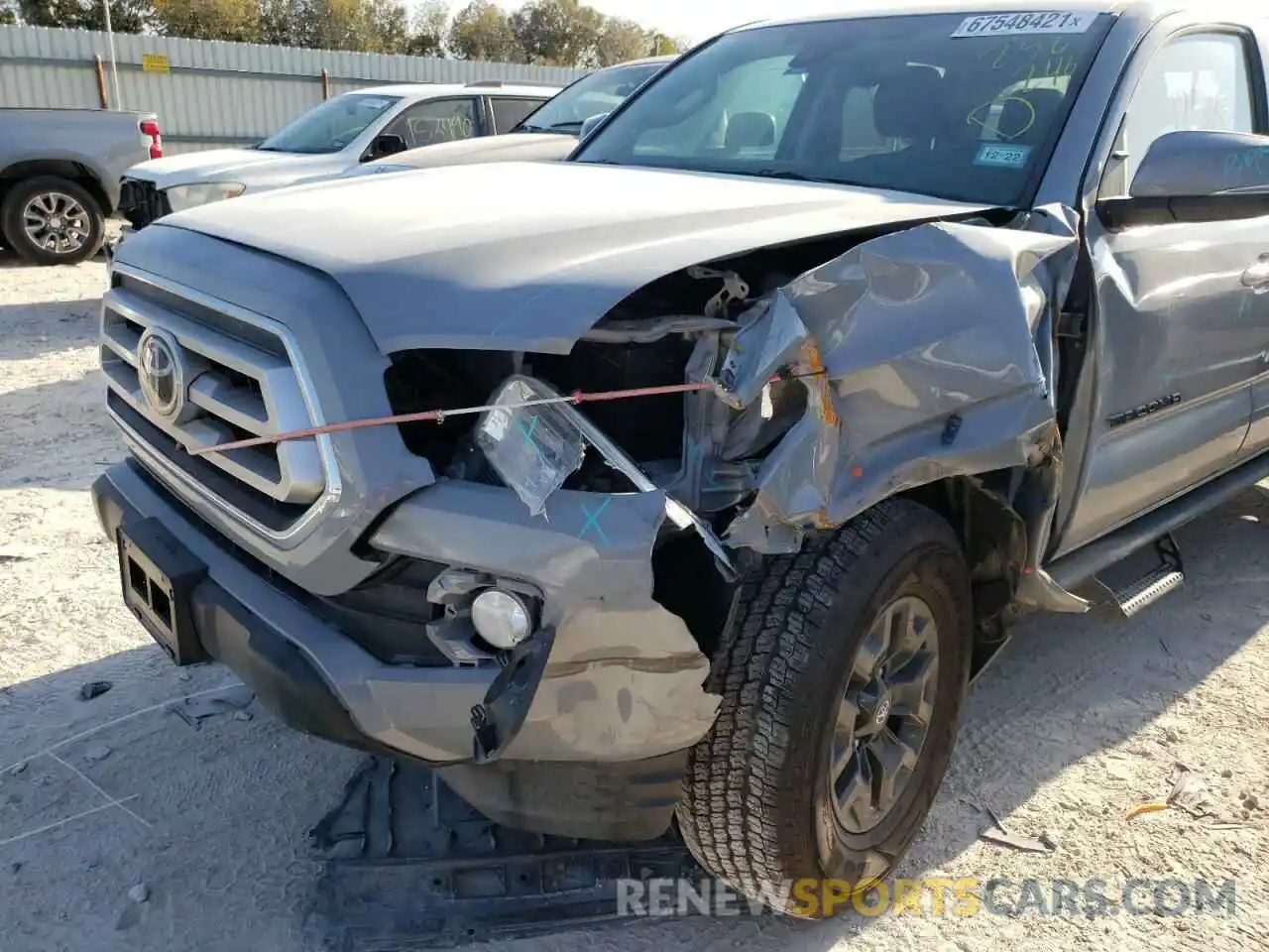 9 Photograph of a damaged car 5TFCZ5AN6MX256246 TOYOTA TACOMA 2021