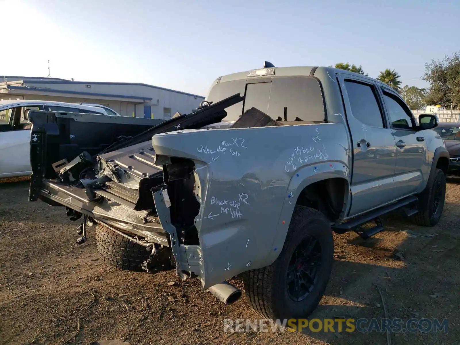 4 Photograph of a damaged car 5TFCZ5AN6MX264587 TOYOTA TACOMA 2021