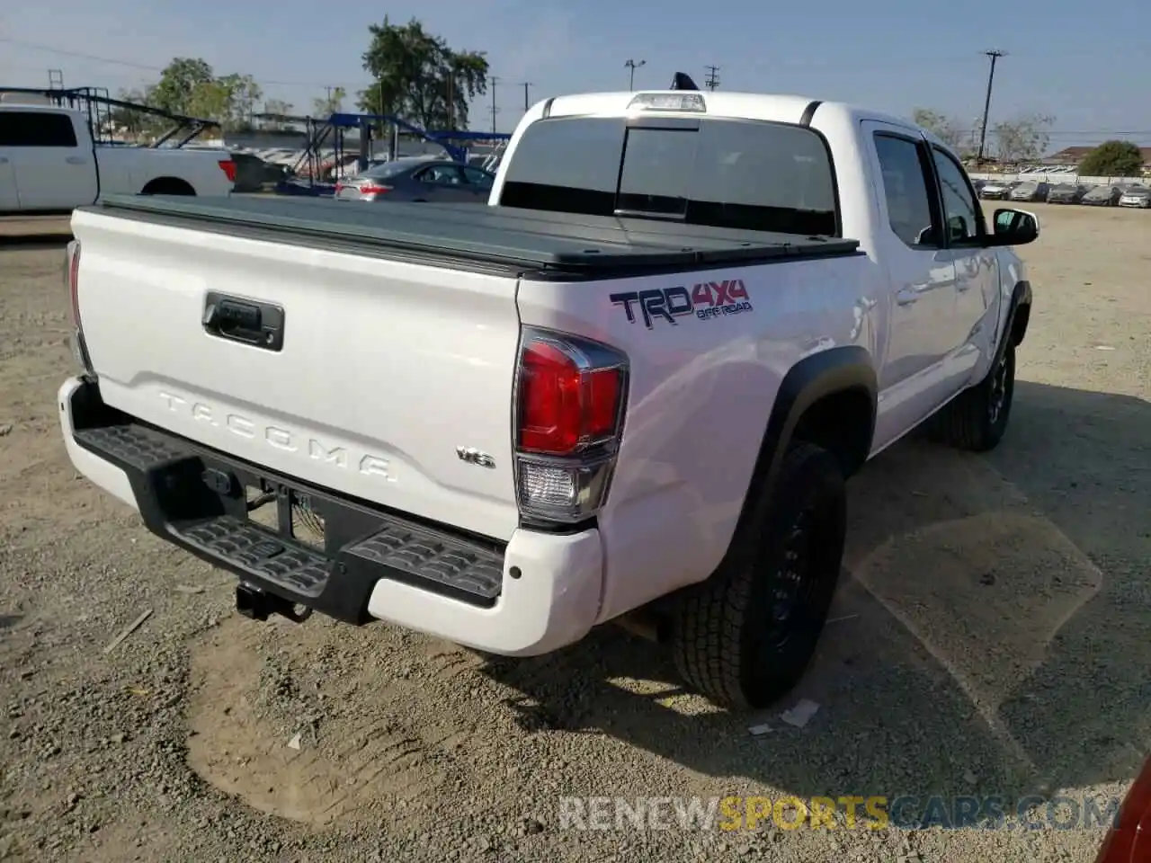 4 Photograph of a damaged car 5TFCZ5AN6MX269059 TOYOTA TACOMA 2021