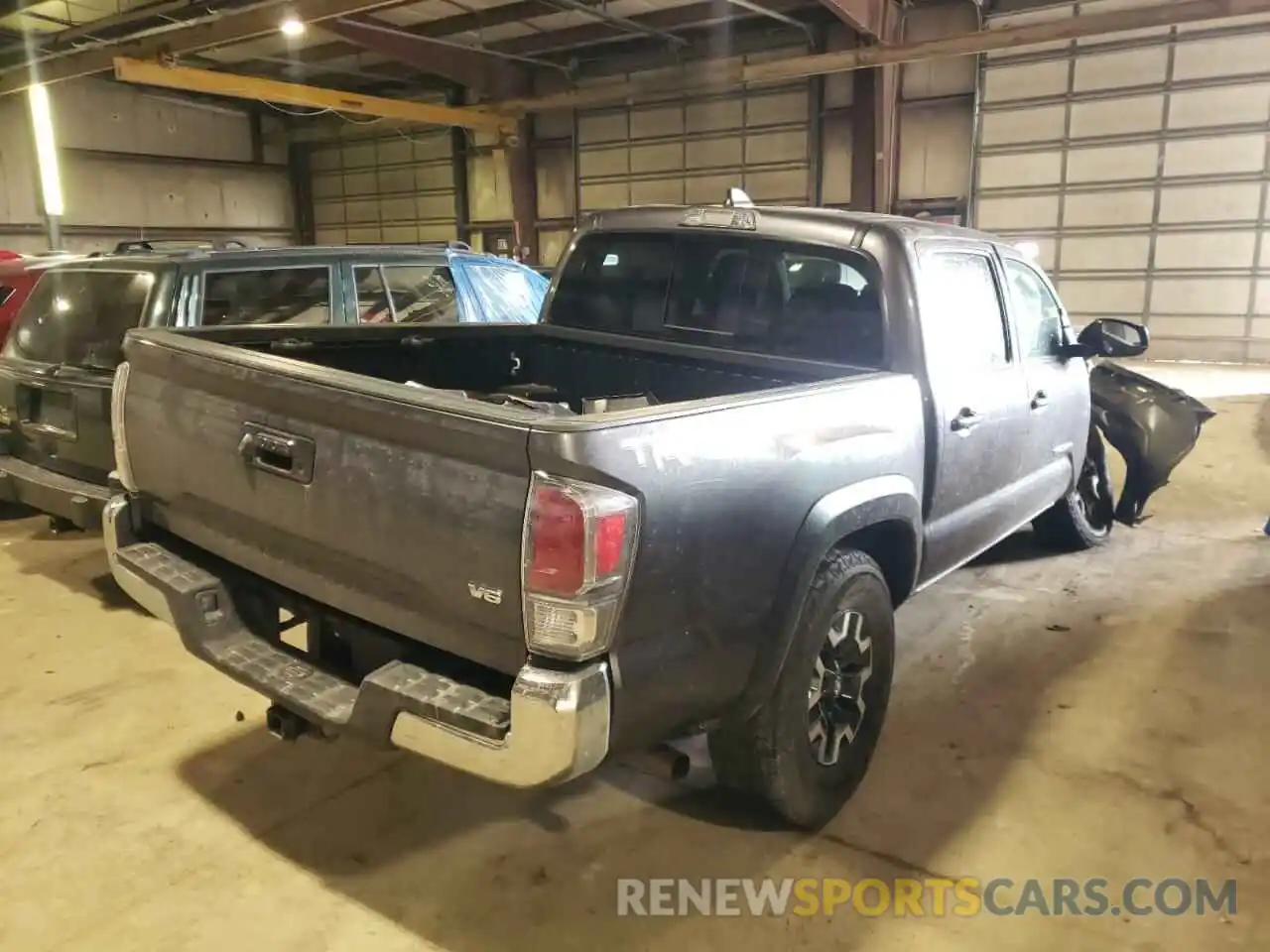 4 Photograph of a damaged car 5TFCZ5AN6MX269272 TOYOTA TACOMA 2021