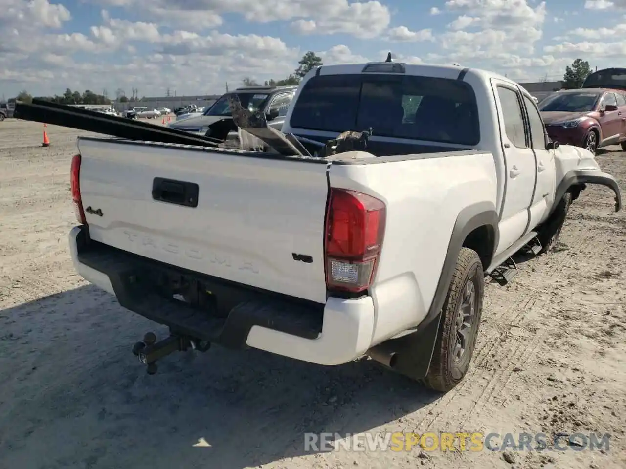 4 Photograph of a damaged car 5TFCZ5AN6MX272270 TOYOTA TACOMA 2021