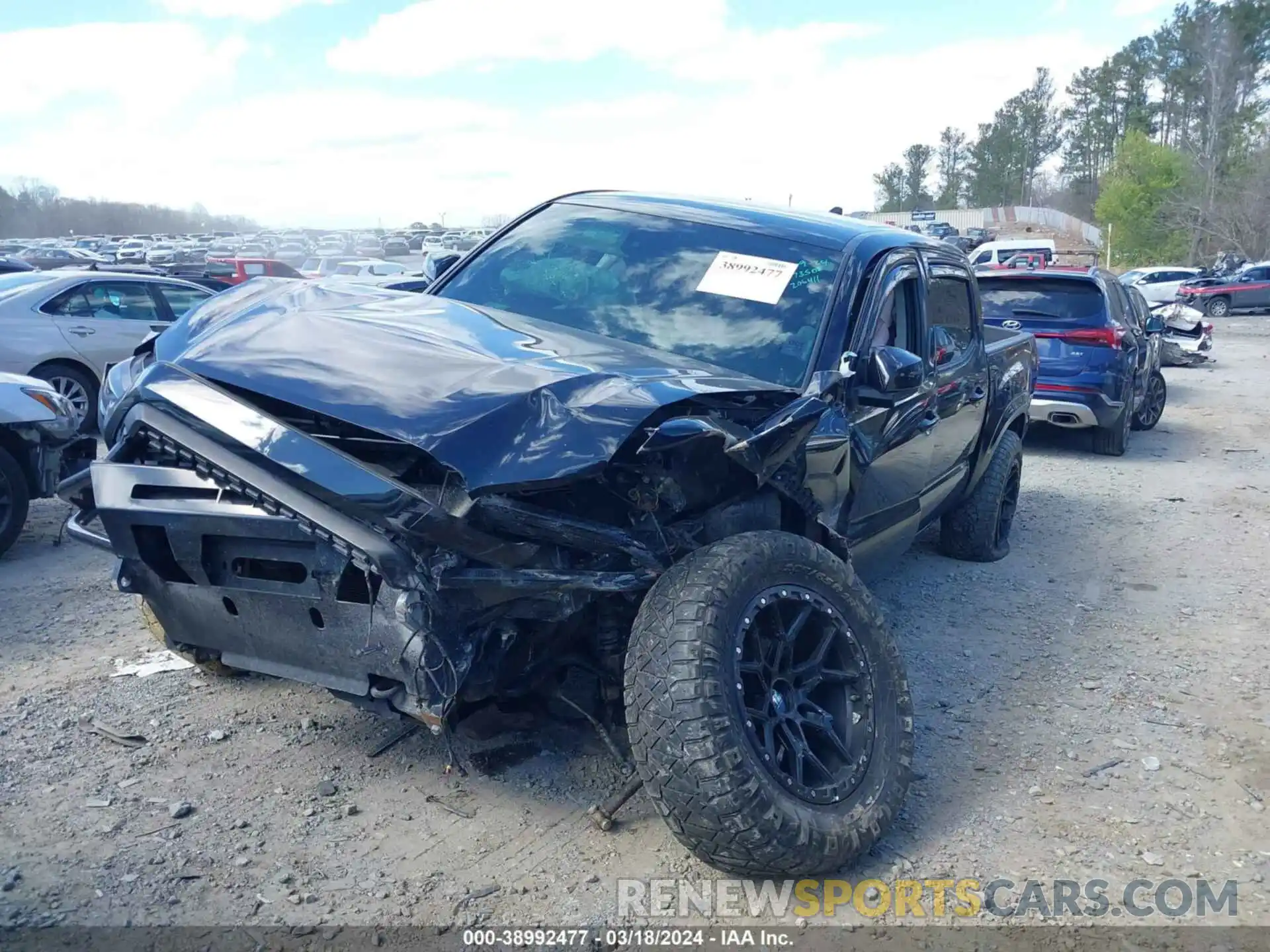 2 Photograph of a damaged car 5TFCZ5AN6MX273502 TOYOTA TACOMA 2021