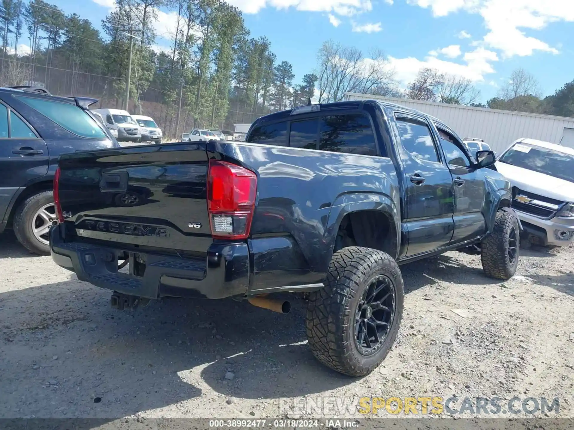 4 Photograph of a damaged car 5TFCZ5AN6MX273502 TOYOTA TACOMA 2021