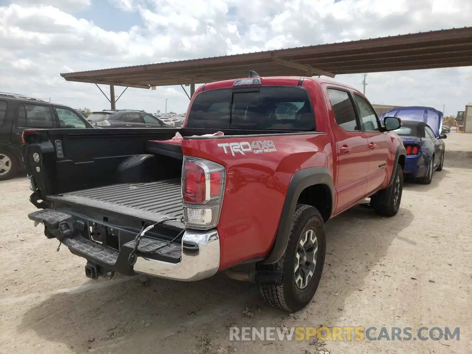 4 Photograph of a damaged car 5TFCZ5AN7MX246423 TOYOTA TACOMA 2021