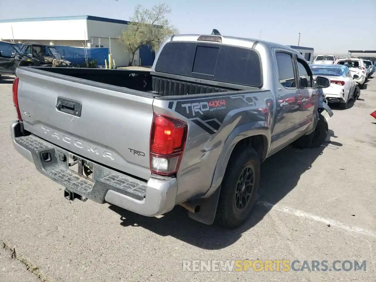 4 Photograph of a damaged car 5TFCZ5AN7MX255669 TOYOTA TACOMA 2021