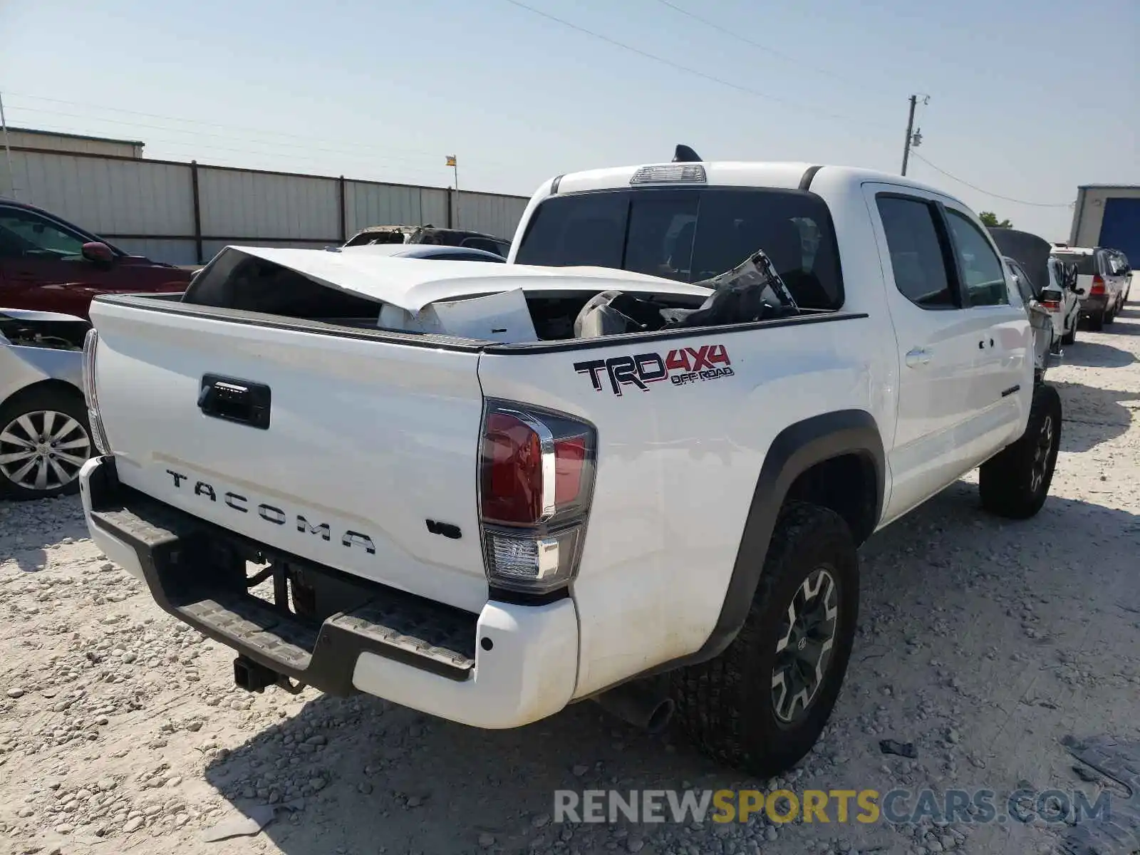 4 Photograph of a damaged car 5TFCZ5AN7MX256448 TOYOTA TACOMA 2021