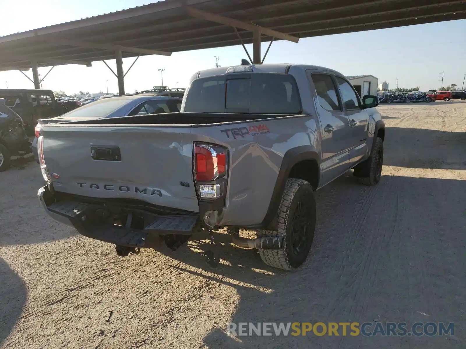 4 Photograph of a damaged car 5TFCZ5AN7MX258443 TOYOTA TACOMA 2021