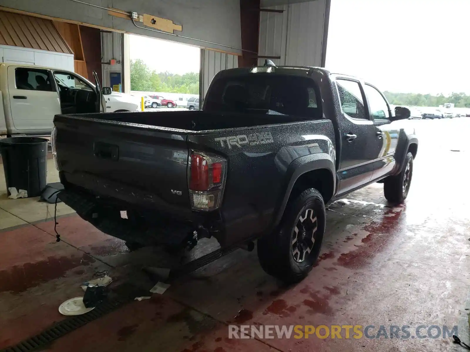 4 Photograph of a damaged car 5TFCZ5AN7MX265067 TOYOTA TACOMA 2021