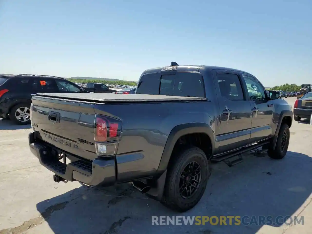 4 Photograph of a damaged car 5TFCZ5AN7MX270012 TOYOTA TACOMA 2021