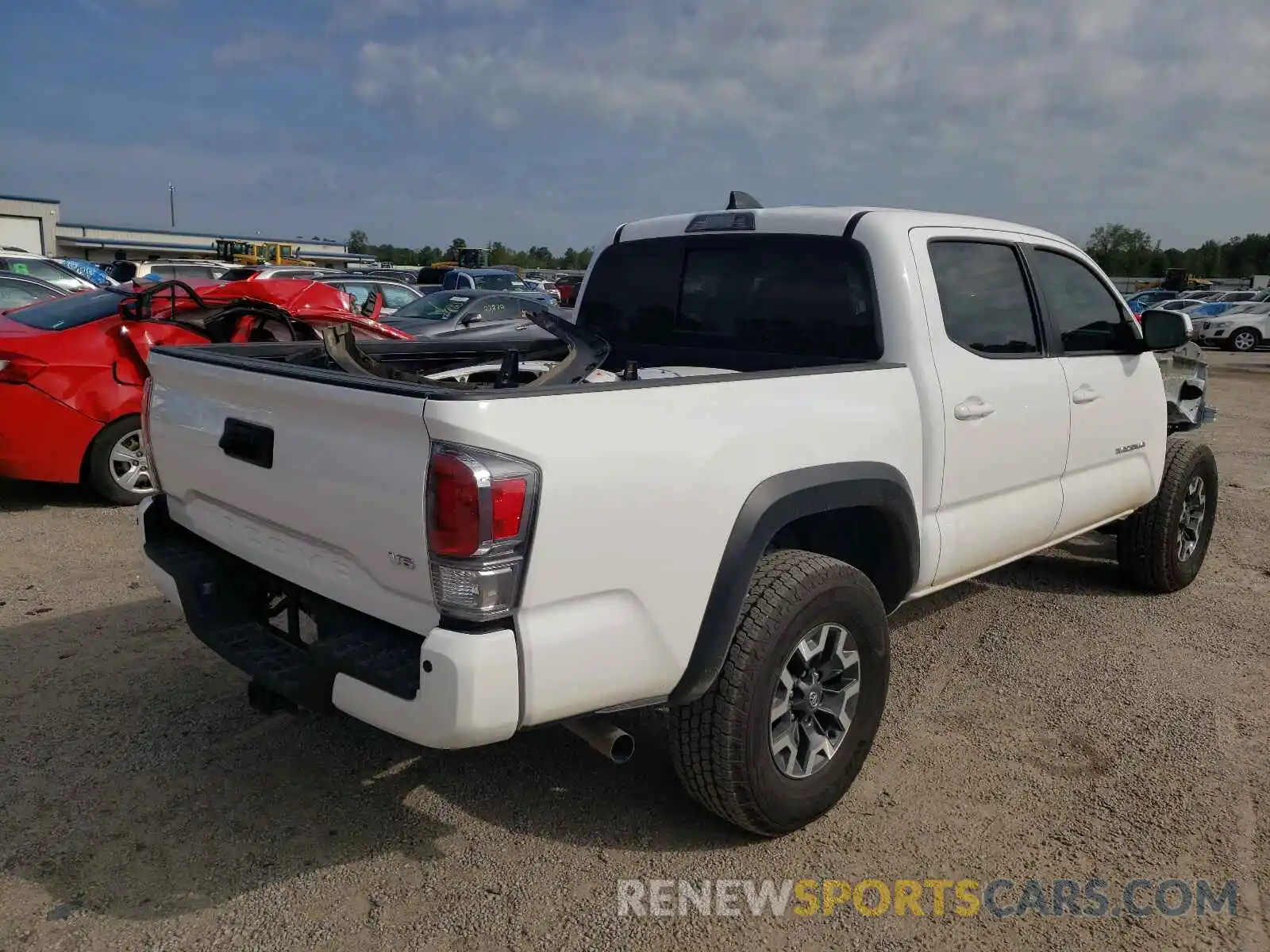 4 Photograph of a damaged car 5TFCZ5AN7MX270155 TOYOTA TACOMA 2021