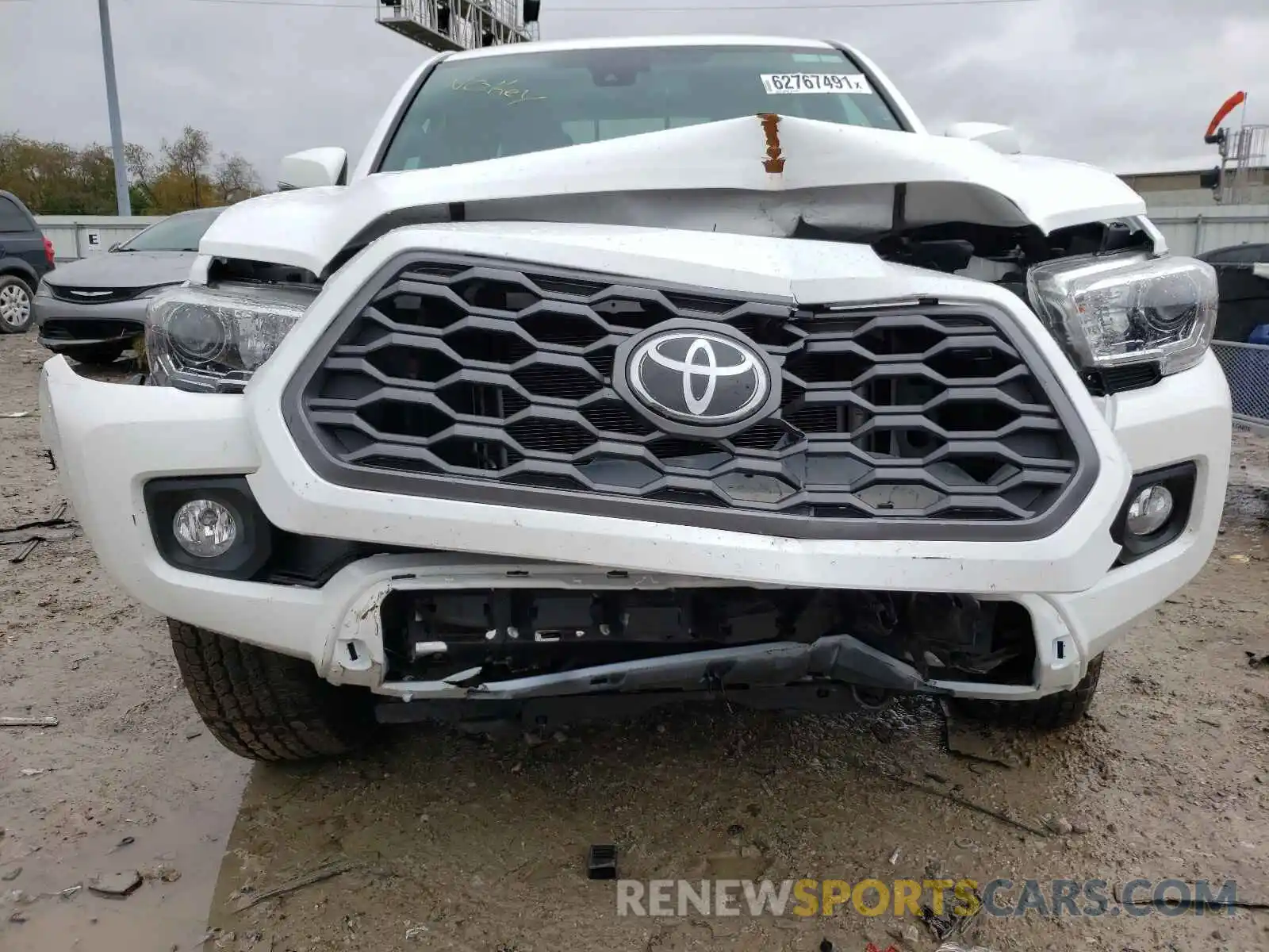 9 Photograph of a damaged car 5TFCZ5AN7MX272598 TOYOTA TACOMA 2021