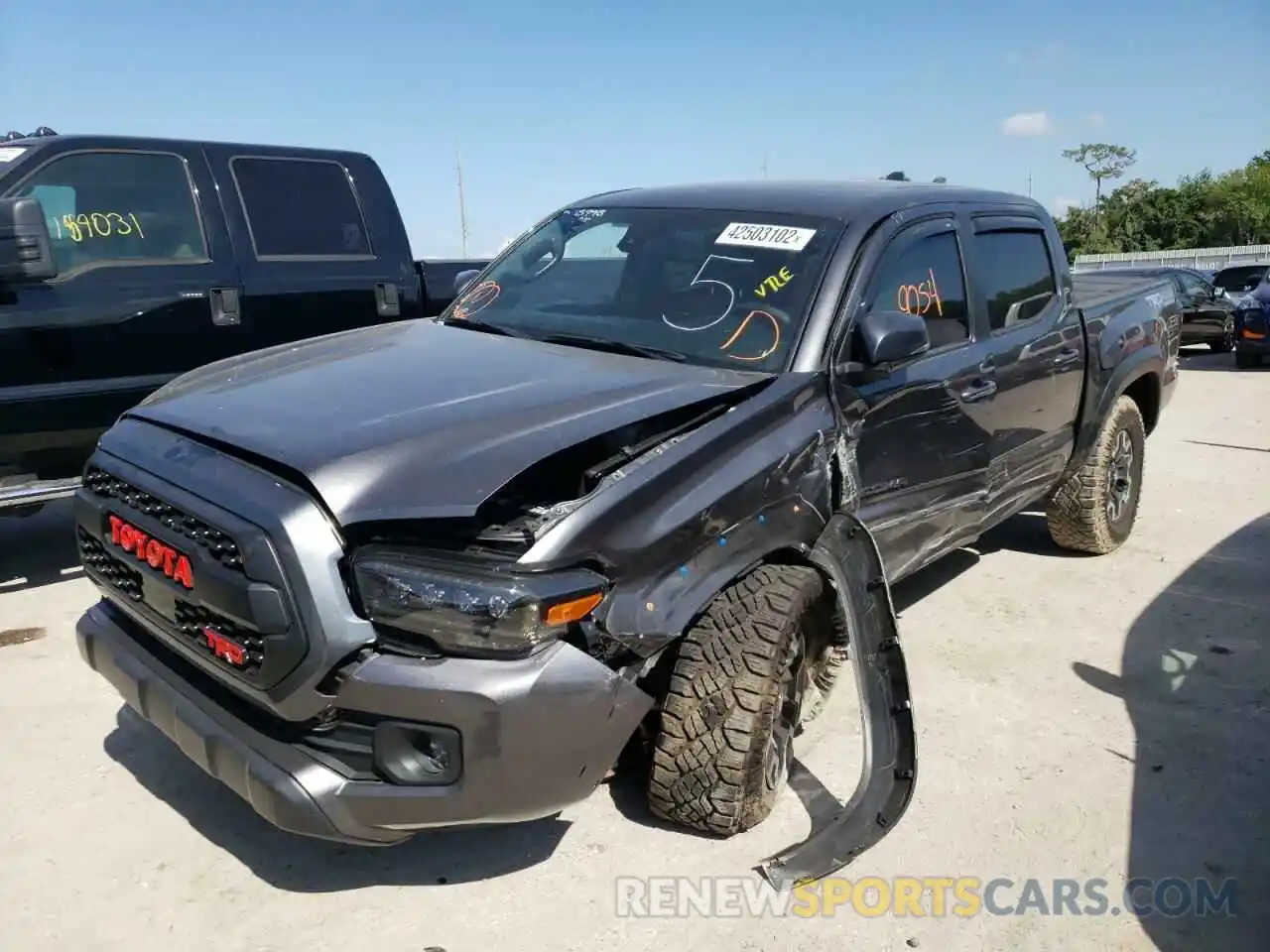 2 Photograph of a damaged car 5TFCZ5AN7MX272665 TOYOTA TACOMA 2021