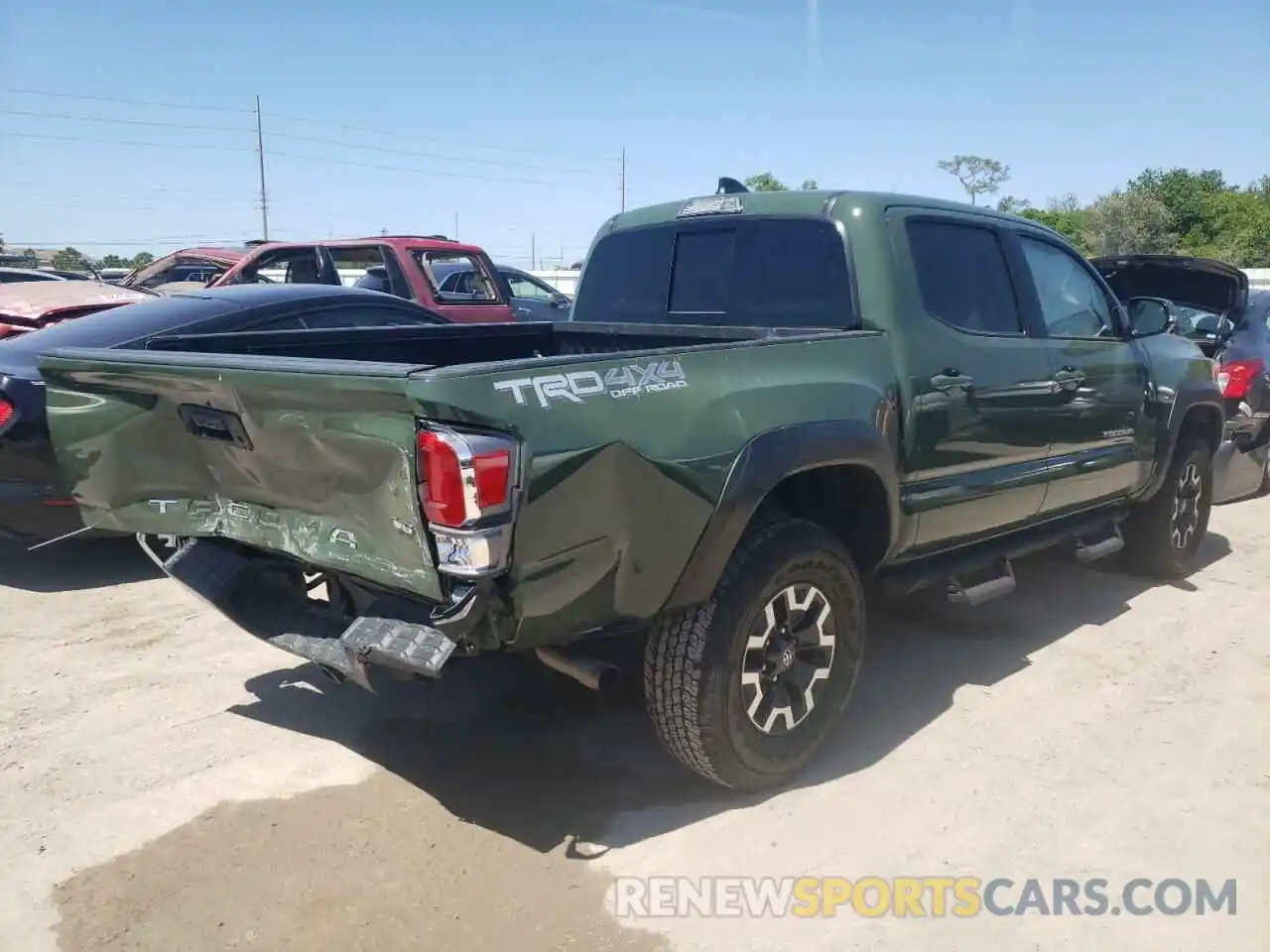 4 Photograph of a damaged car 5TFCZ5AN7MX277333 TOYOTA TACOMA 2021