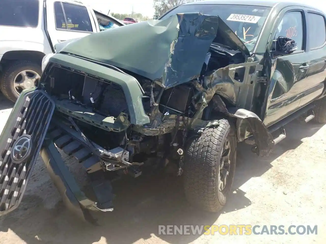 9 Photograph of a damaged car 5TFCZ5AN7MX277333 TOYOTA TACOMA 2021