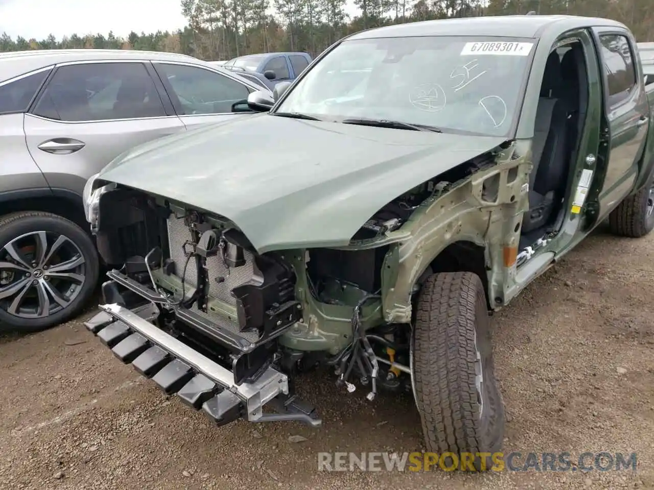 9 Photograph of a damaged car 5TFCZ5AN7MX279003 TOYOTA TACOMA 2021