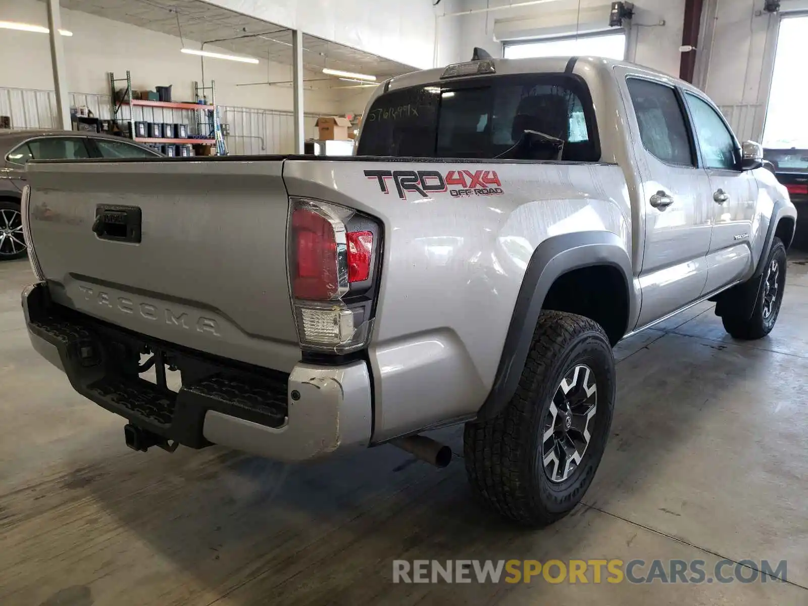 4 Photograph of a damaged car 5TFCZ5AN8MX244387 TOYOTA TACOMA 2021