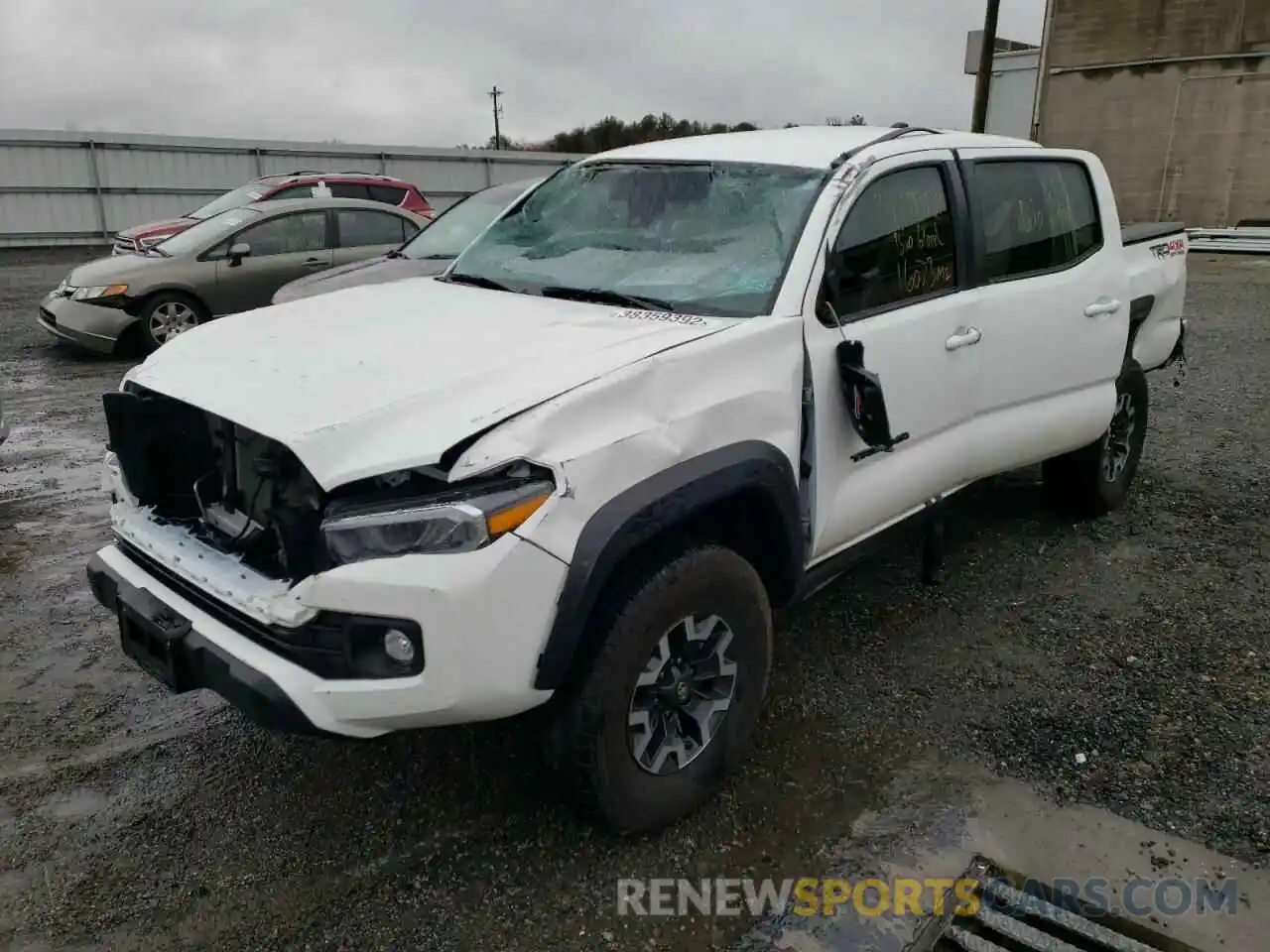 2 Photograph of a damaged car 5TFCZ5AN8MX246432 TOYOTA TACOMA 2021