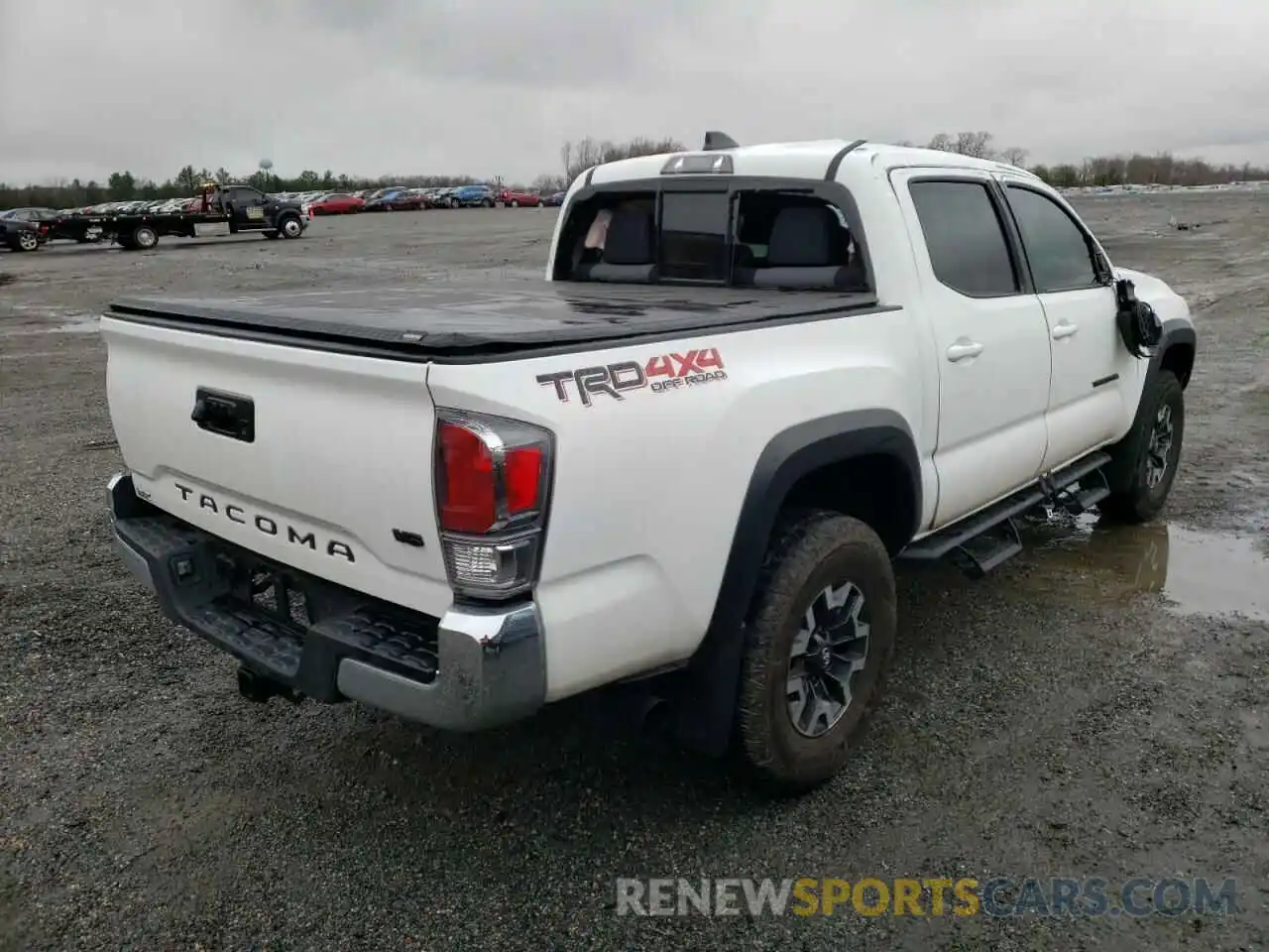 4 Photograph of a damaged car 5TFCZ5AN8MX246432 TOYOTA TACOMA 2021