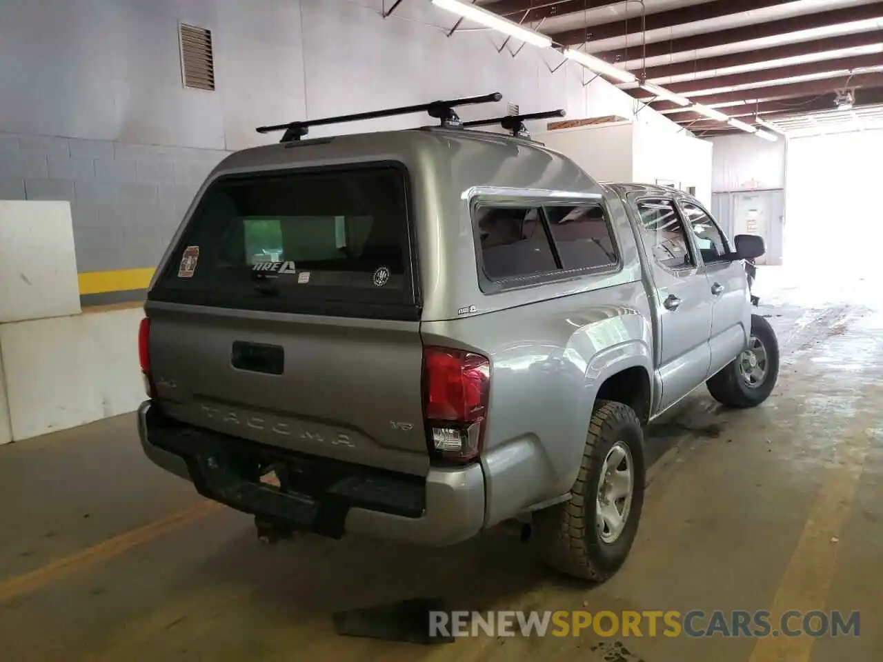 4 Photograph of a damaged car 5TFCZ5AN8MX252568 TOYOTA TACOMA 2021