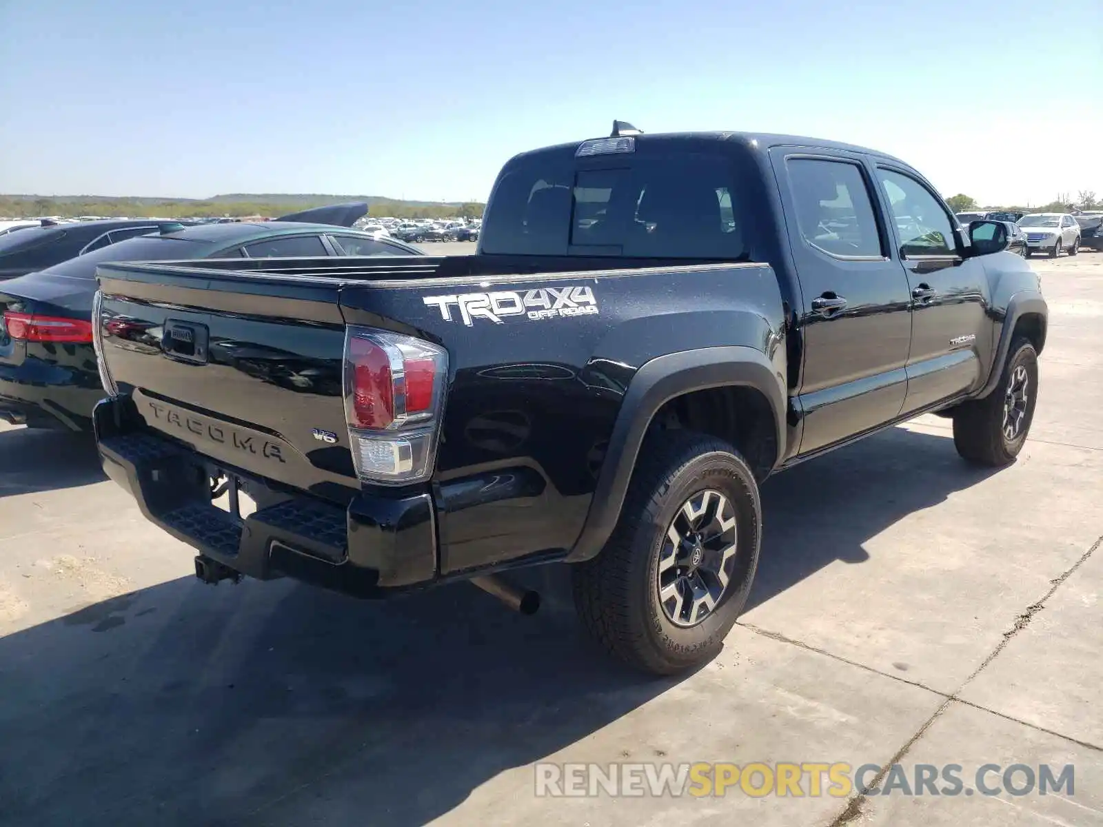 4 Photograph of a damaged car 5TFCZ5AN8MX263036 TOYOTA TACOMA 2021