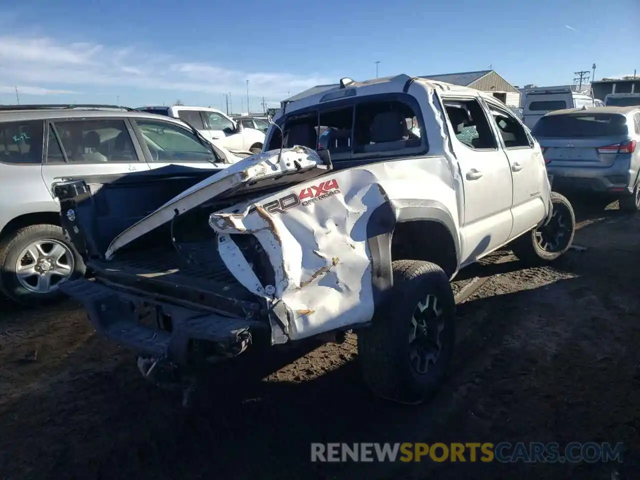 4 Photograph of a damaged car 5TFCZ5AN8MX268494 TOYOTA TACOMA 2021