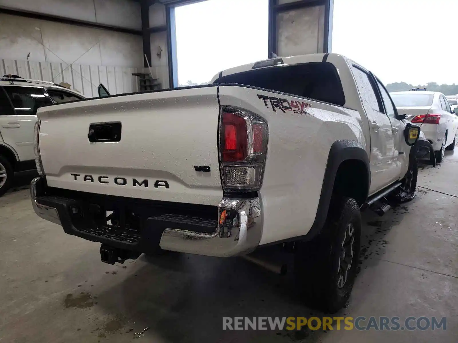 4 Photograph of a damaged car 5TFCZ5AN8MX271055 TOYOTA TACOMA 2021