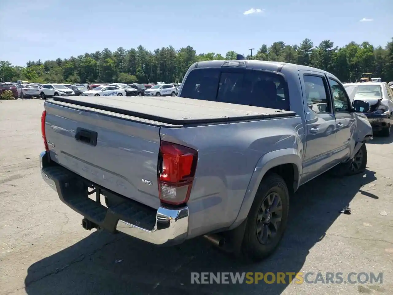 4 Photograph of a damaged car 5TFCZ5AN8MX282878 TOYOTA TACOMA 2021