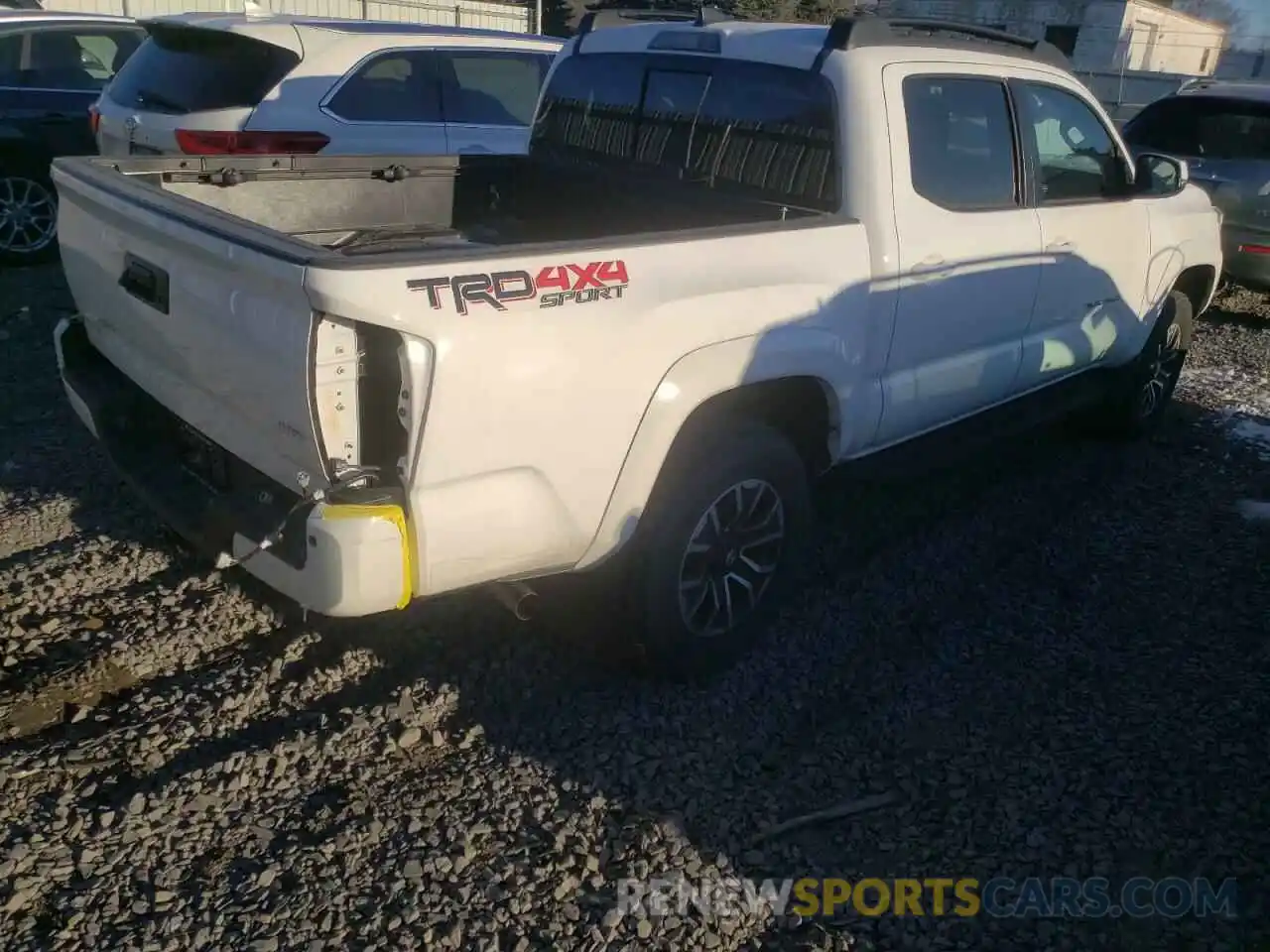 4 Photograph of a damaged car 5TFCZ5AN9MX250800 TOYOTA TACOMA 2021