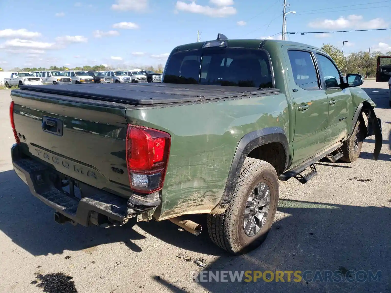 4 Photograph of a damaged car 5TFCZ5AN9MX253423 TOYOTA TACOMA 2021