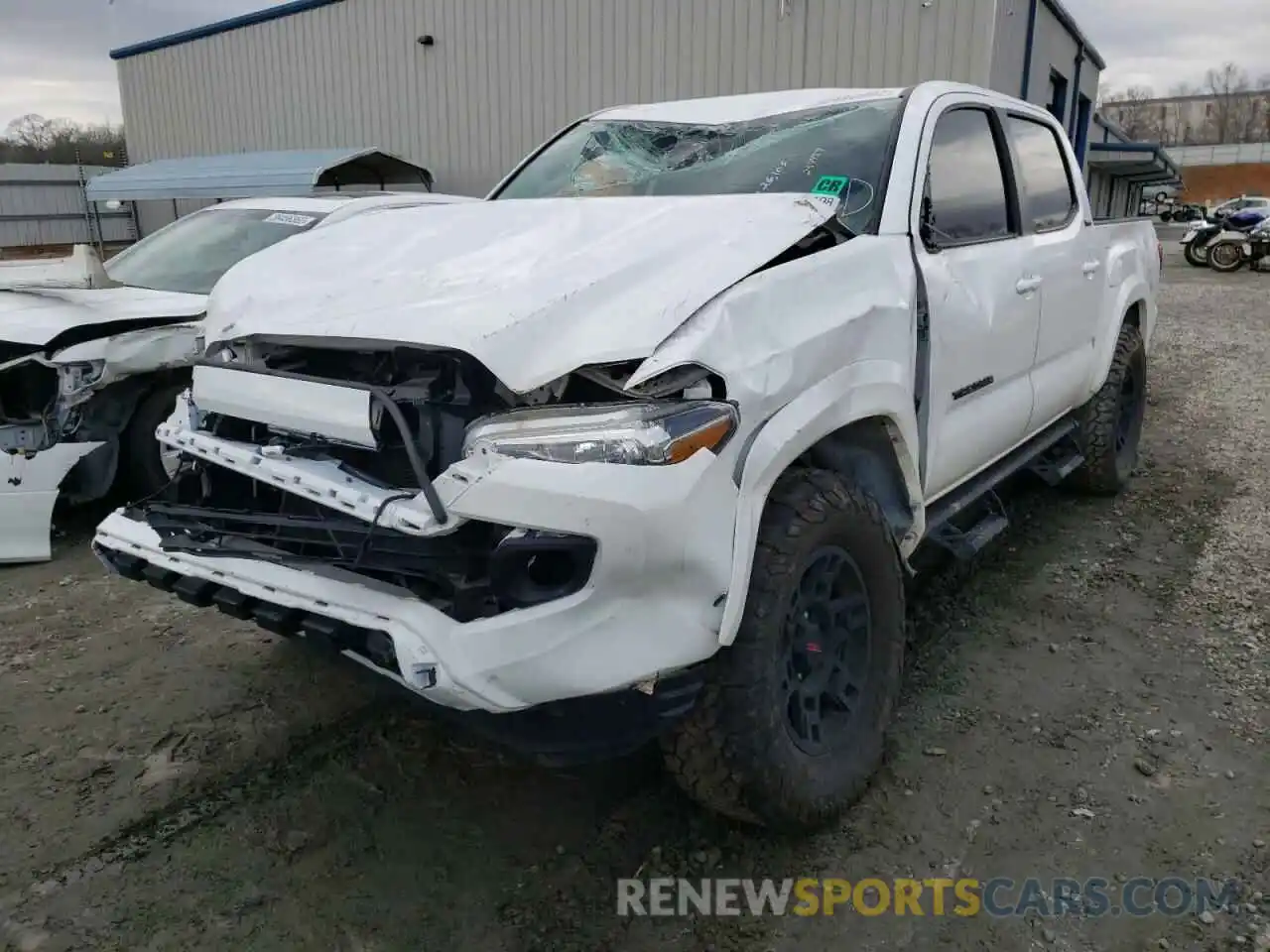 2 Photograph of a damaged car 5TFCZ5AN9MX254457 TOYOTA TACOMA 2021