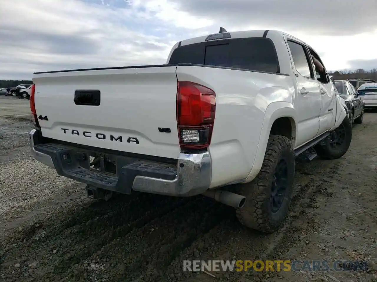 4 Photograph of a damaged car 5TFCZ5AN9MX254457 TOYOTA TACOMA 2021