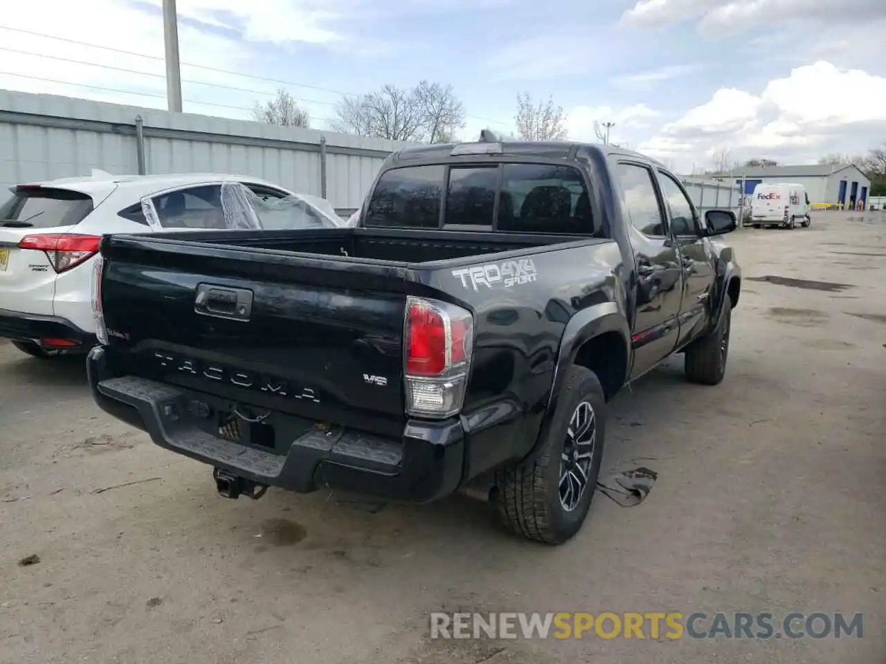 4 Photograph of a damaged car 5TFCZ5AN9MX259738 TOYOTA TACOMA 2021