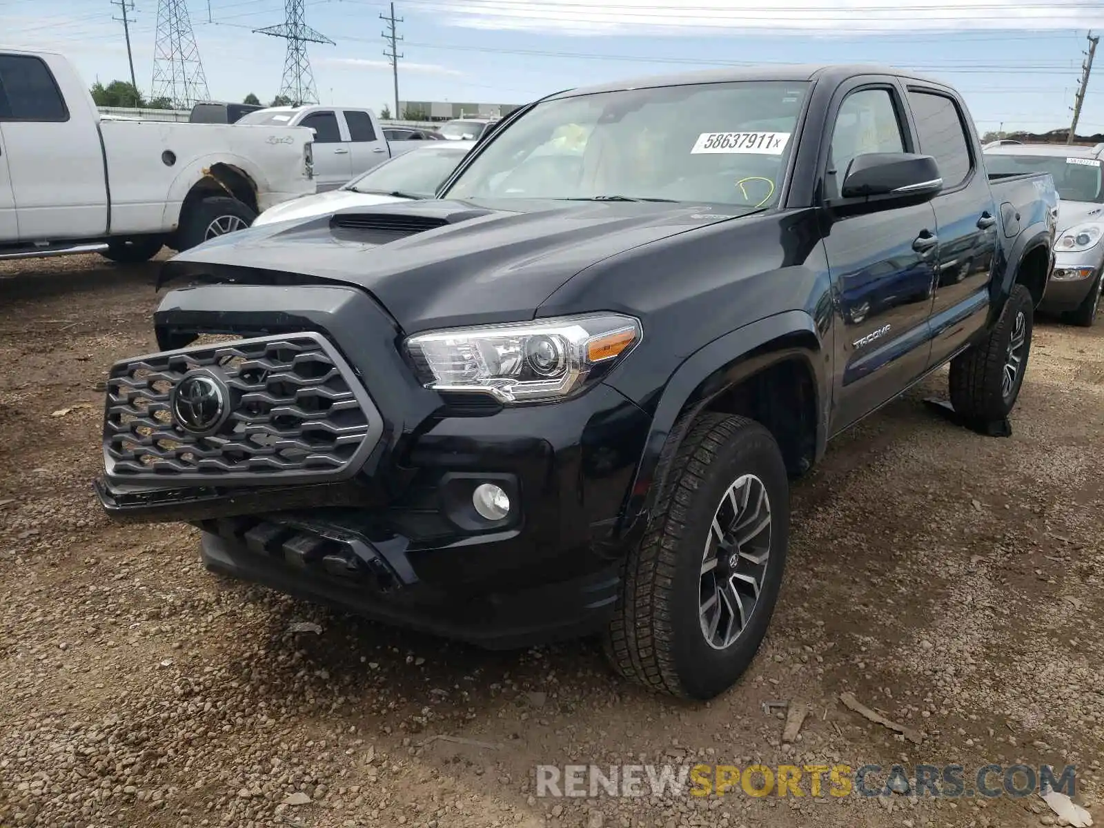 2 Photograph of a damaged car 5TFCZ5AN9MX261036 TOYOTA TACOMA 2021