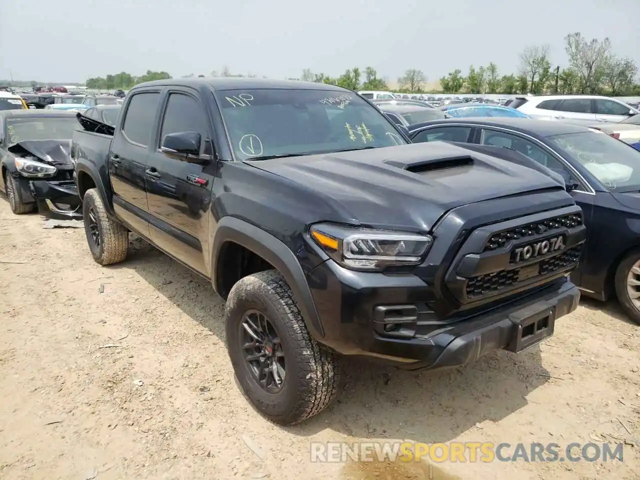 1 Photograph of a damaged car 5TFCZ5AN9MX264406 TOYOTA TACOMA 2021