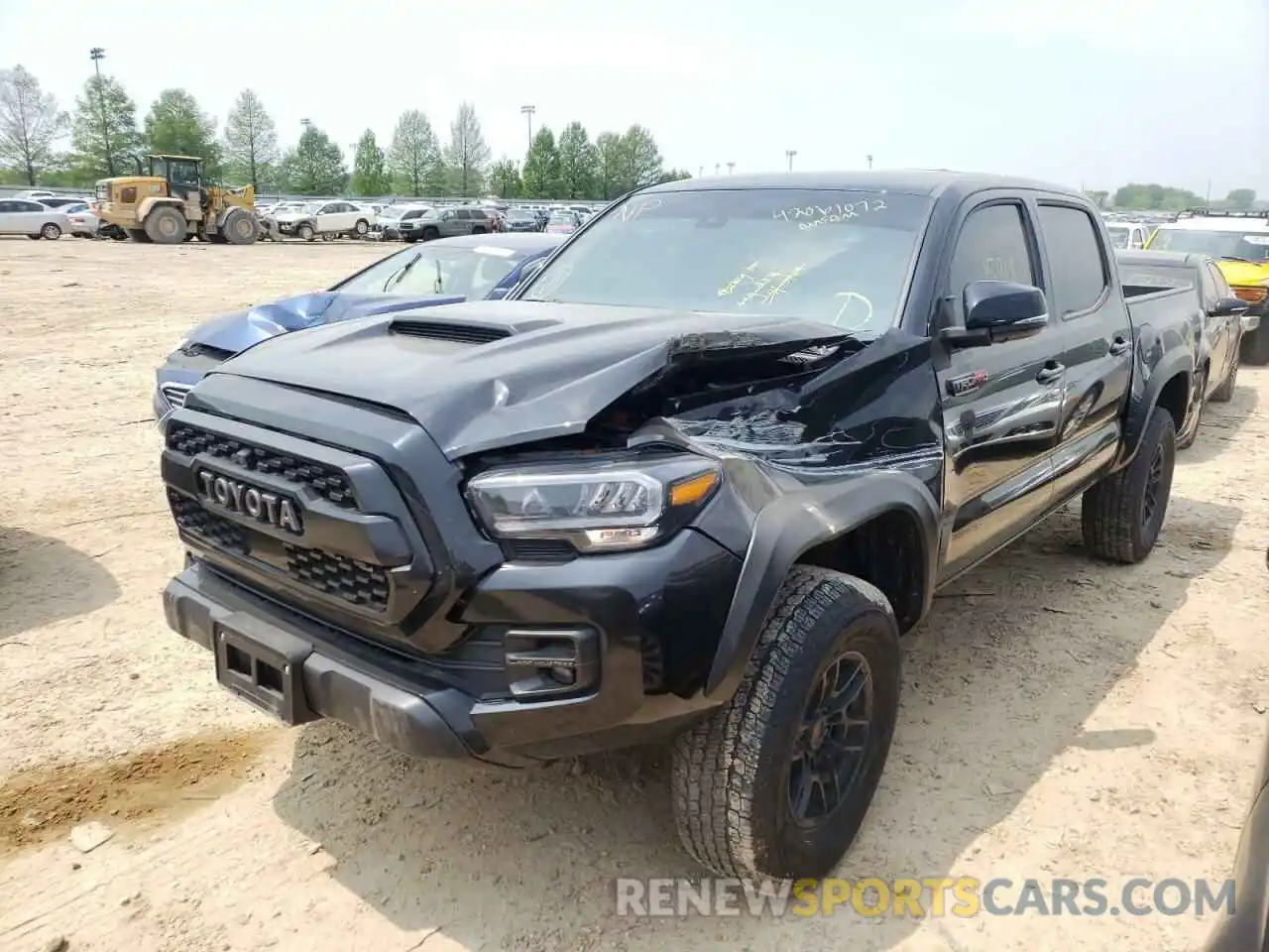 2 Photograph of a damaged car 5TFCZ5AN9MX264406 TOYOTA TACOMA 2021