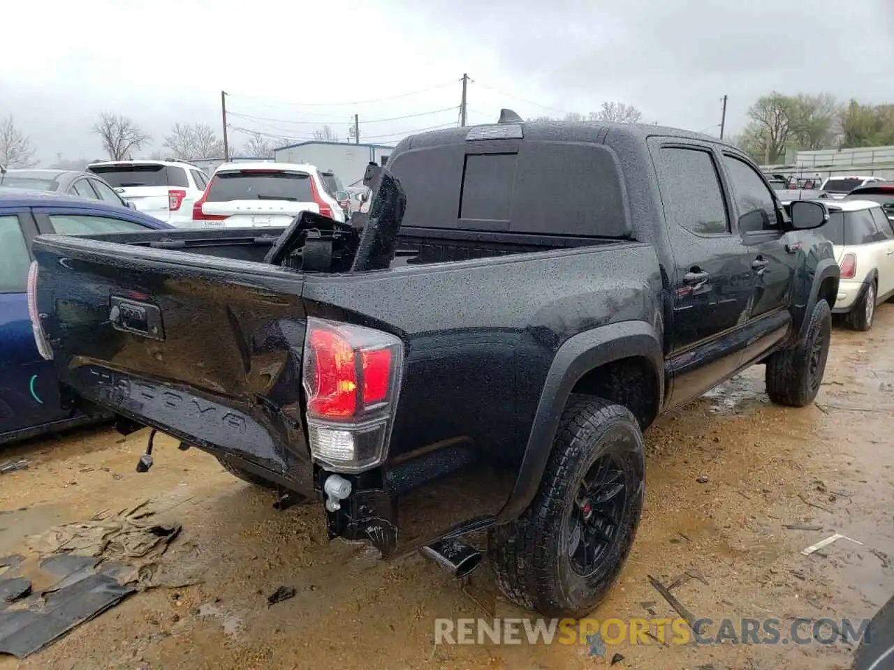 4 Photograph of a damaged car 5TFCZ5AN9MX264406 TOYOTA TACOMA 2021