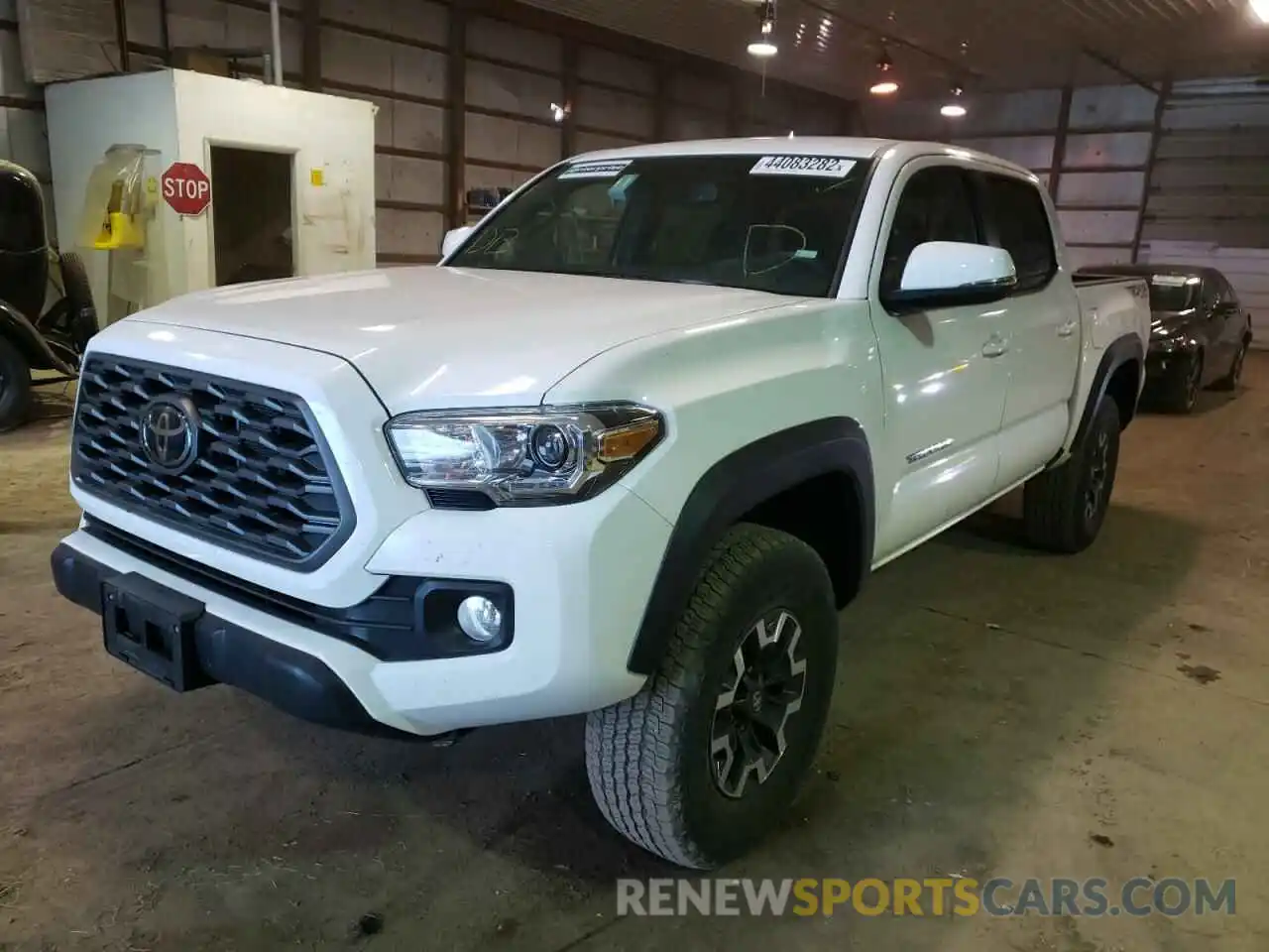 2 Photograph of a damaged car 5TFCZ5AN9MX274806 TOYOTA TACOMA 2021