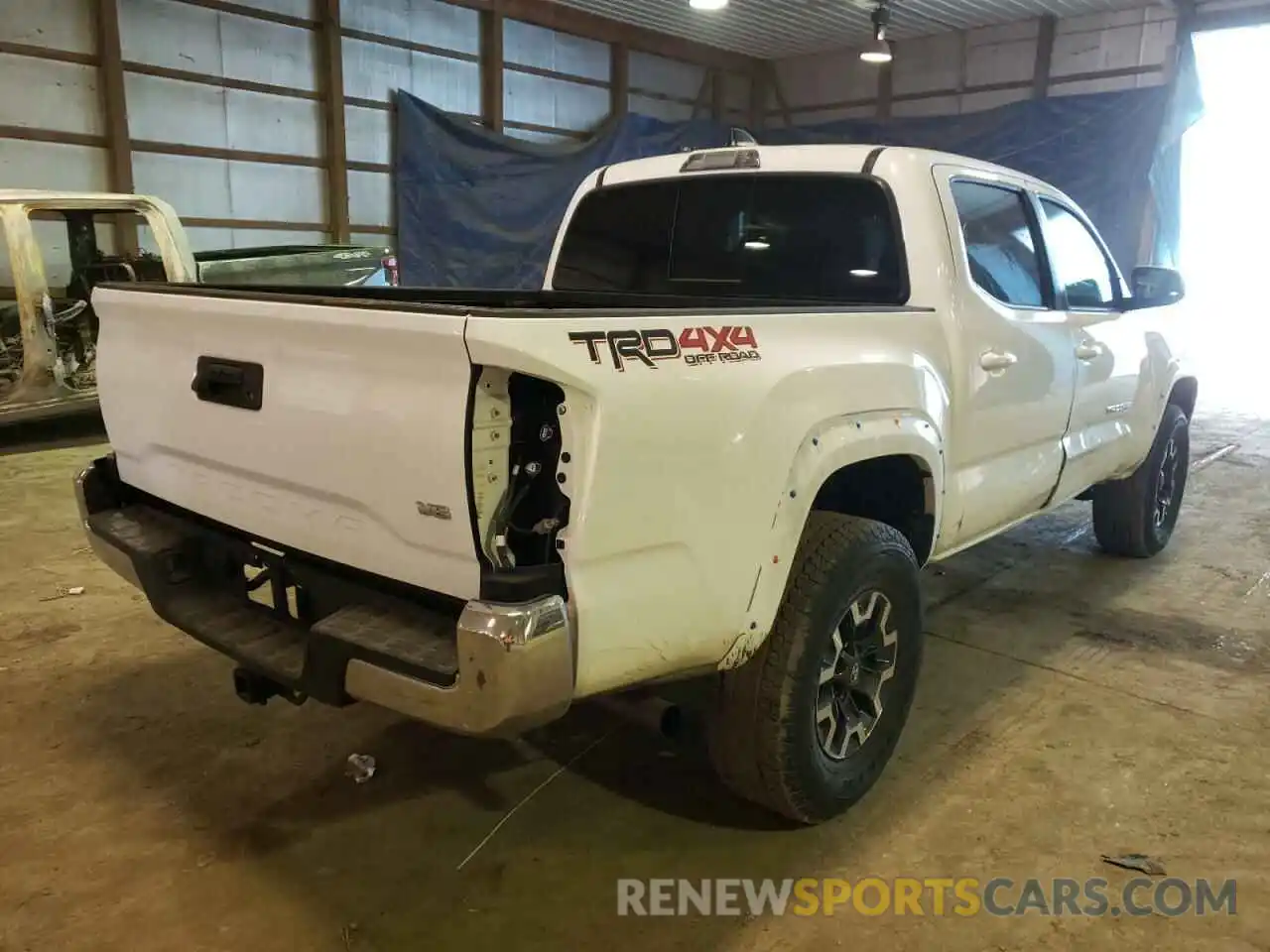 4 Photograph of a damaged car 5TFCZ5AN9MX274806 TOYOTA TACOMA 2021