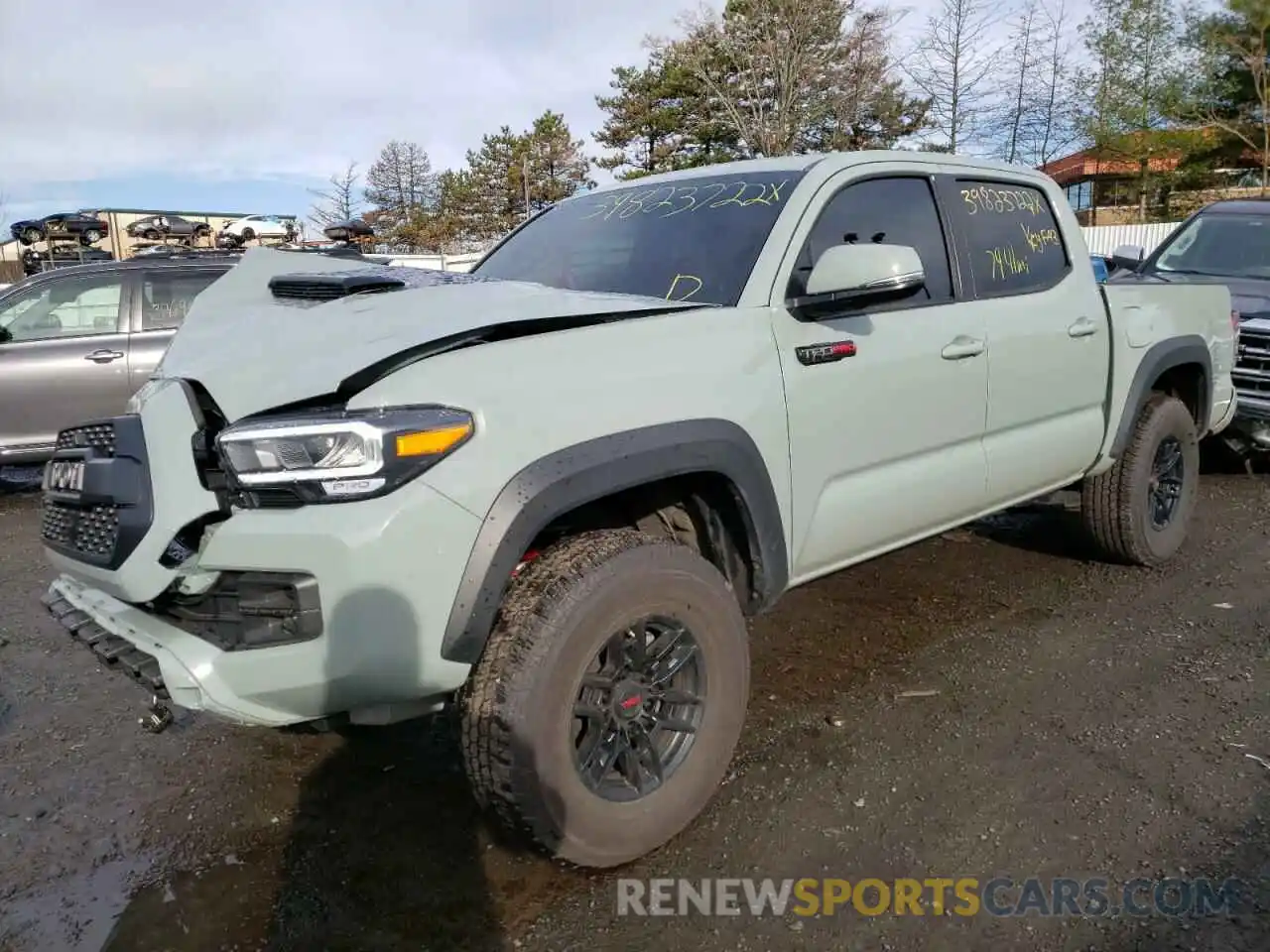 2 Photograph of a damaged car 5TFCZ5AN9MX282341 TOYOTA TACOMA 2021