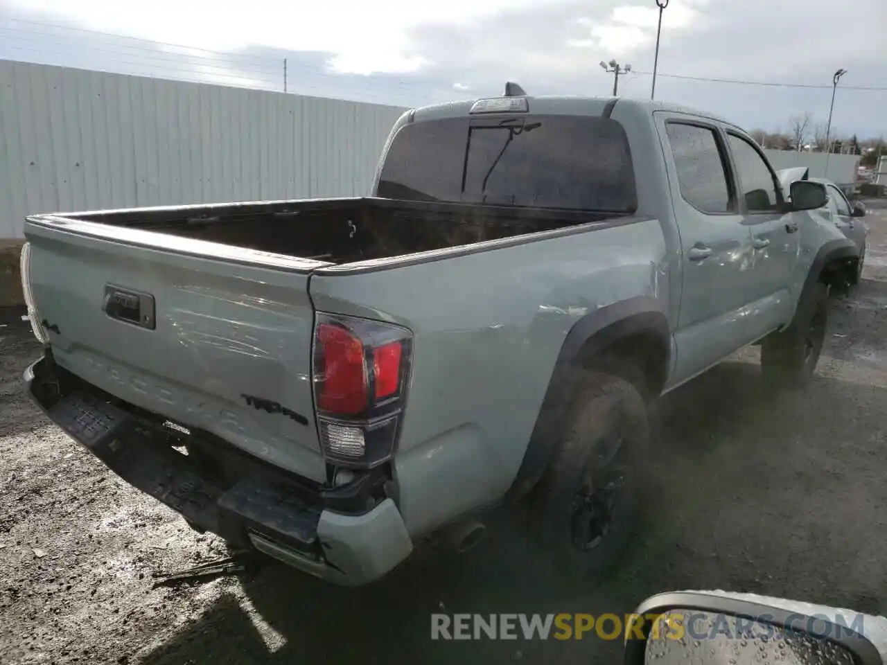 4 Photograph of a damaged car 5TFCZ5AN9MX282341 TOYOTA TACOMA 2021