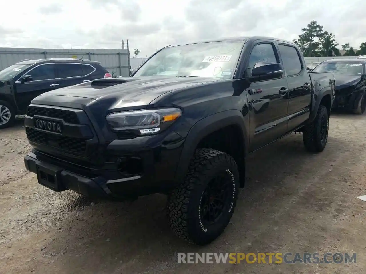 2 Photograph of a damaged car 5TFCZ5ANXMX260154 TOYOTA TACOMA 2021