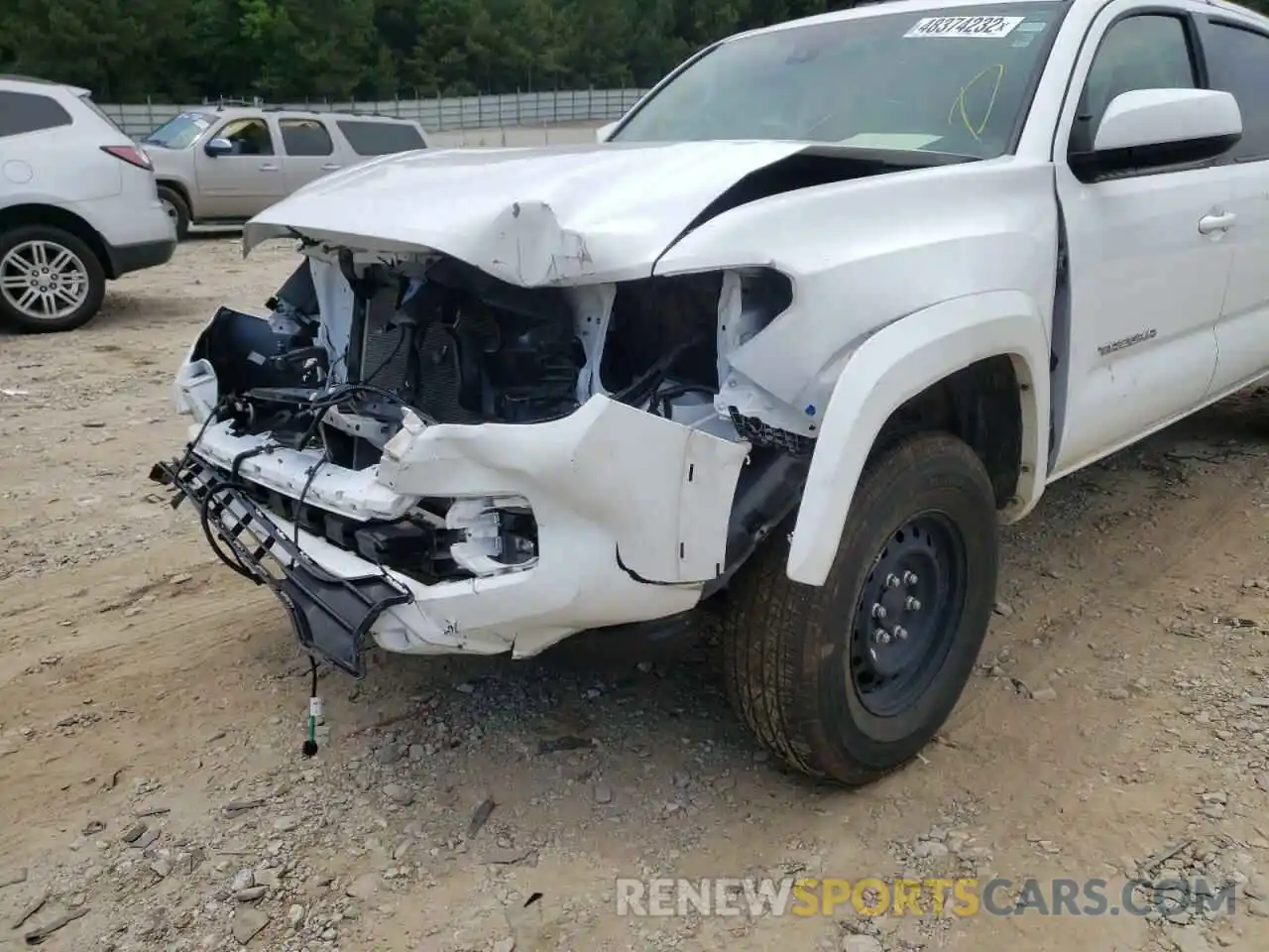 9 Photograph of a damaged car 5TFDZ5BN1MX058273 TOYOTA TACOMA 2021