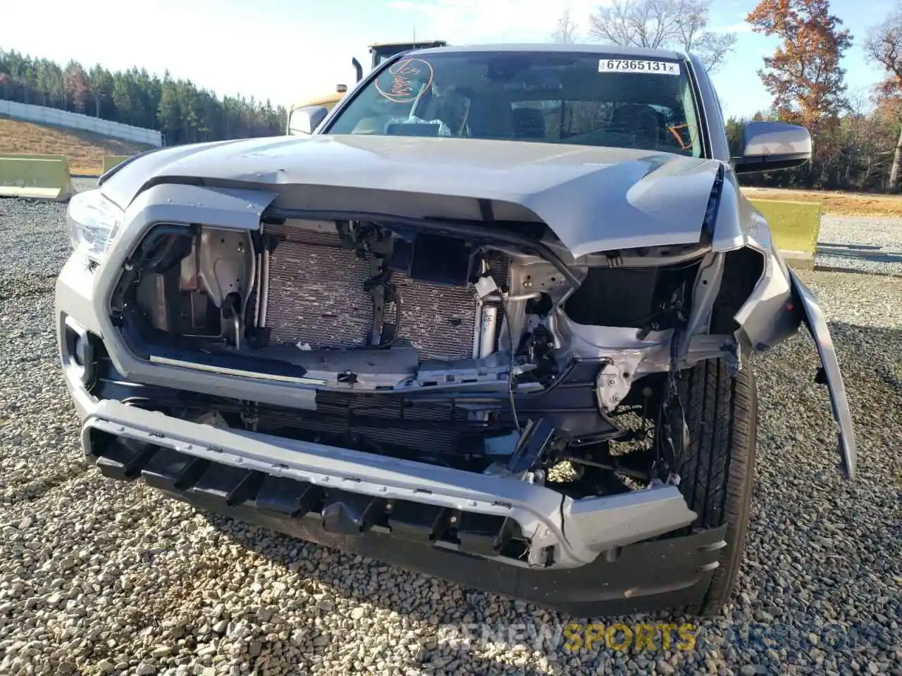 9 Photograph of a damaged car 5TFDZ5BN9MX066556 TOYOTA TACOMA 2021