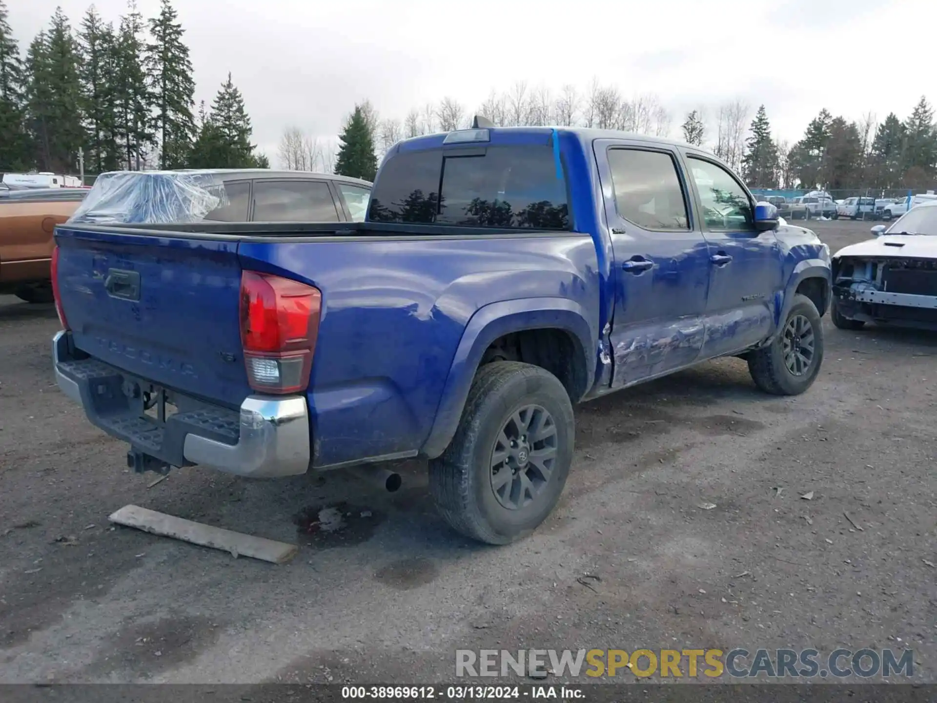 4 Photograph of a damaged car 3TMAZ5CN0NM163220 TOYOTA TACOMA 2022