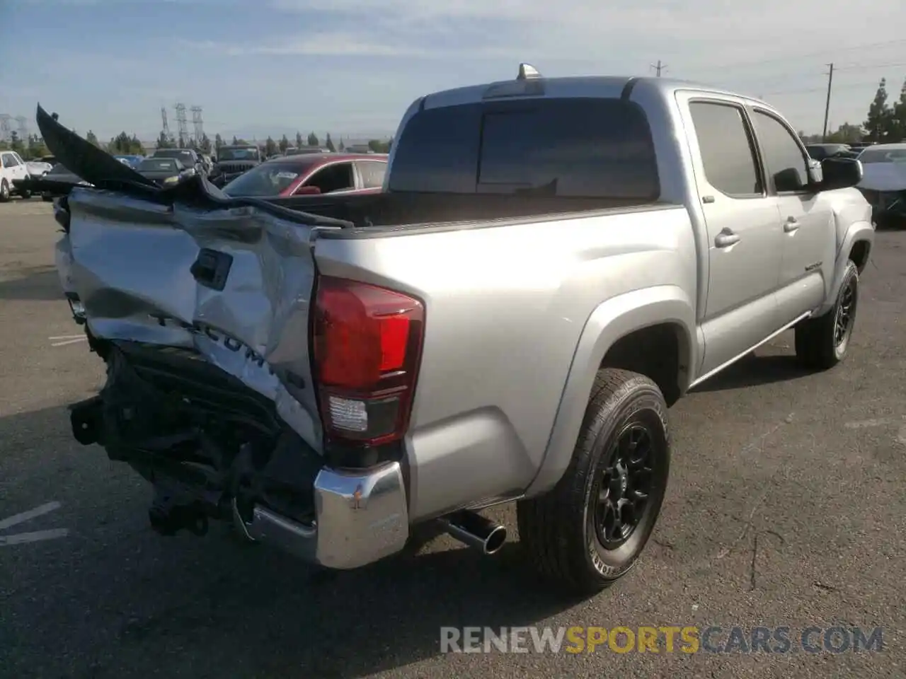 4 Photograph of a damaged car 3TMAZ5CN0NM167865 TOYOTA TACOMA 2022