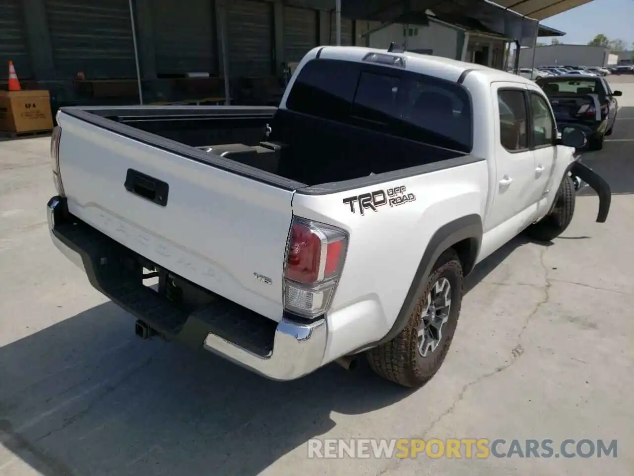 4 Photograph of a damaged car 3TMAZ5CN0NM173715 TOYOTA TACOMA 2022