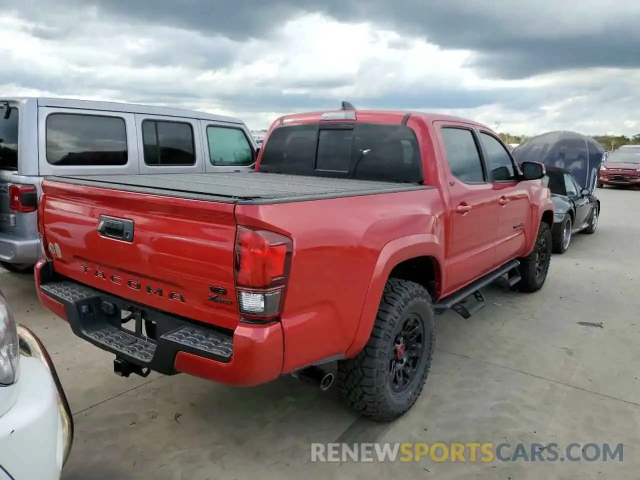 4 Photograph of a damaged car 3TMAZ5CN0NM175836 TOYOTA TACOMA 2022