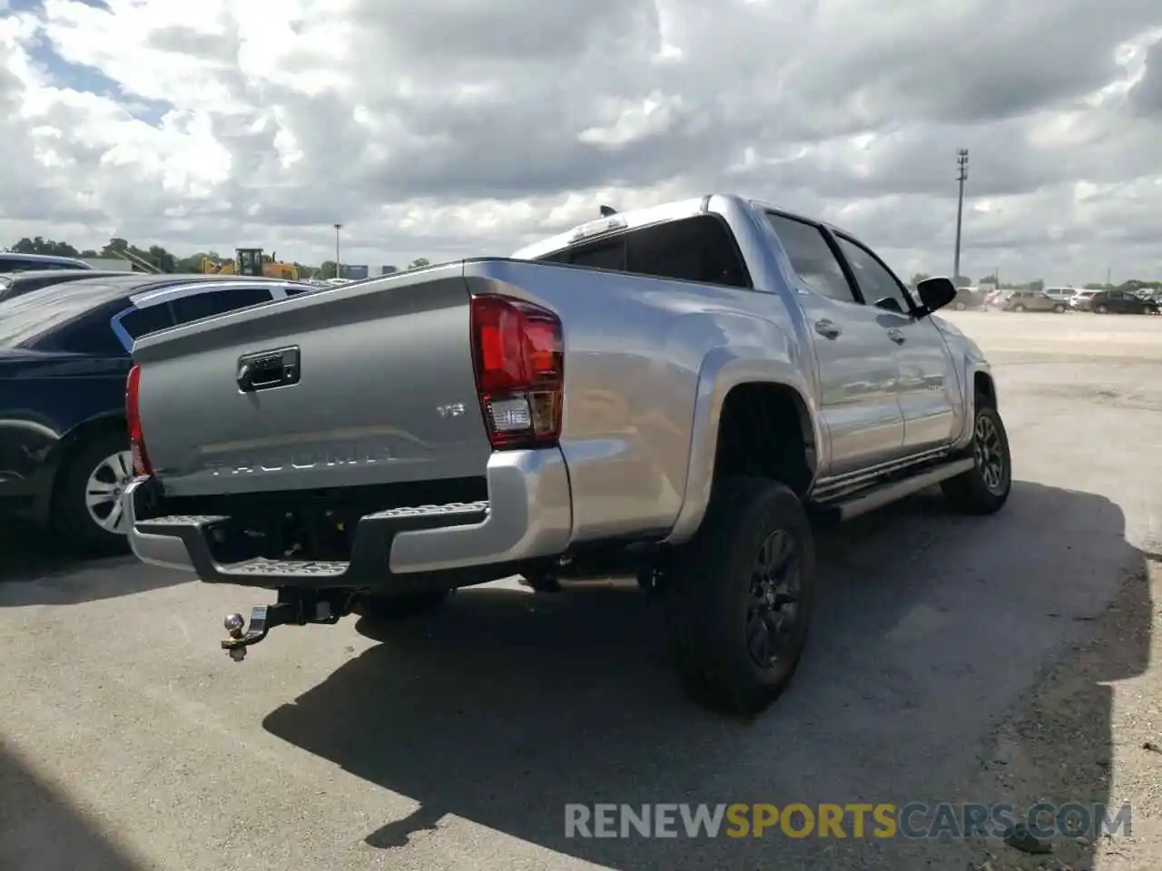 4 Photograph of a damaged car 3TMAZ5CN0NM179580 TOYOTA TACOMA 2022